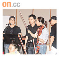  學友（左）將與小提琴家姚珏（右）及一班小朋友樂手同台演出。