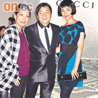  黃奕（右起）、姜凱與Gucci高層鄧婉穎在時裝騷上合照。