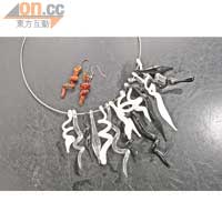 螺旋狀嘅頸鏈跟耳環，出自藝術家王茵茵之手。頸鏈$1,200，耳環$80。