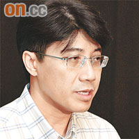 周達明