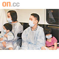 一對男女連同兩名幼童由明愛醫院轉到瑪嘉烈醫院。