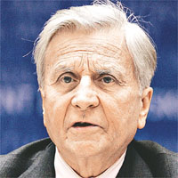 特里謝稱現時說危機已經結束是言之過早。	資料圖片