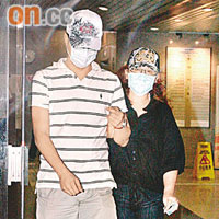 女嬰父母文國威（左）及梁修賢（右）昨出席死因研訊。