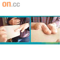 骨科醫生利用紙張，測試求診者的手指無力感。