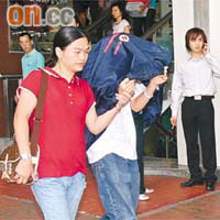 爭產案中，陳振聰妻子譚妙清及兒子一度成為傳媒追訪對象。