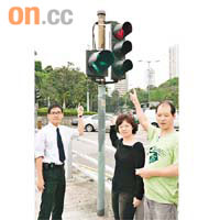譚榮勳（左）指「孖仔燈」複雜，運輸署未吸取教訓。