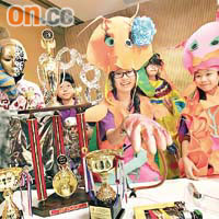 博愛醫院陳楷紀念中學七名初中生，憑自創劇本、音樂、舞蹈等，以廢料製造道具及服裝，在國際賽中奪冠。