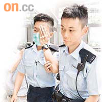 被指掌摑司機的警員眼角受傷，由同袍陪同送院。