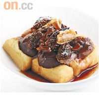 冬菇羊肚菌燜腐皮$118<br>樹記的「頭浸」腐皮，由師傅每日大清早爭回來，豆味夠濃的原因是選用加拿大優質黃豆所做，配以菌味濃郁、價格不菲的羊肚菌，便成一道極品素菜。